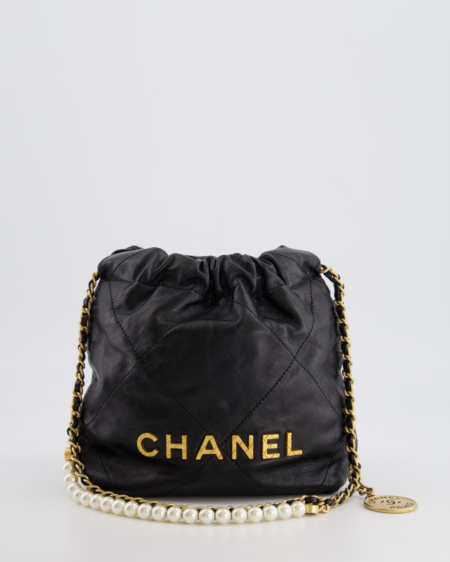 Chanel Black Mini 22 Bag in Calfskin Leather with Gold Hardware and Pearls CC Chain Detail
