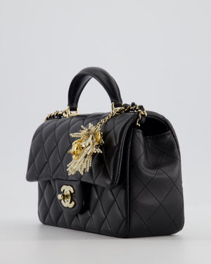 Chanel Black Mini Rectangular Top Handle Flap Bag in Lambskin Leather with Champagne Hardware and Pearl Crystal Lion Charm