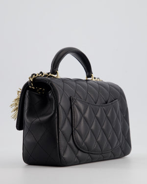 Chanel Black Mini Rectangular Top Handle Flap Bag in Lambskin Leather with Champagne Hardware and Pearl Crystal Lion Charm