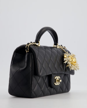 Chanel Black Mini Rectangular Top Handle Flap Bag in Lambskin Leather with Champagne Hardware and Pearl Crystal Lion Charm
