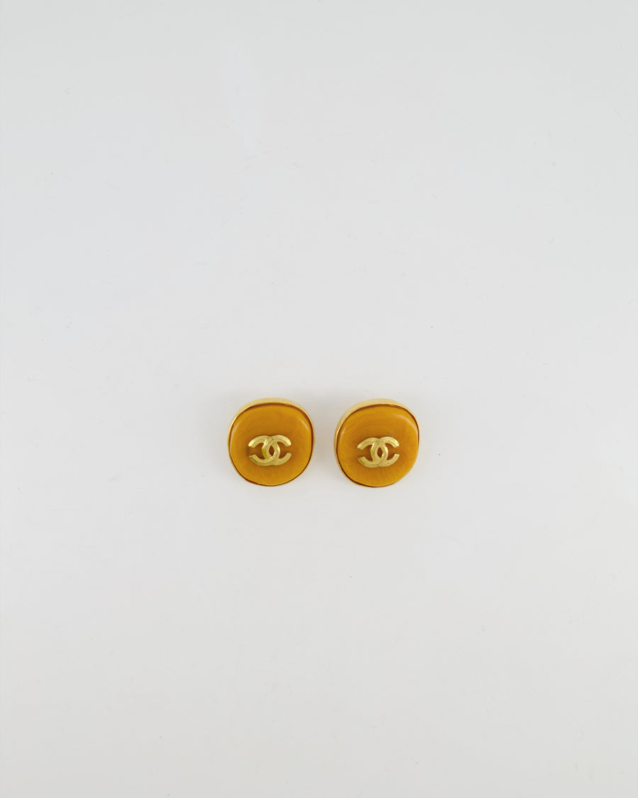 Chanel Vintage 98P Orange Rounded Clip On Earrings with Gold Rim and CC Logo Detail