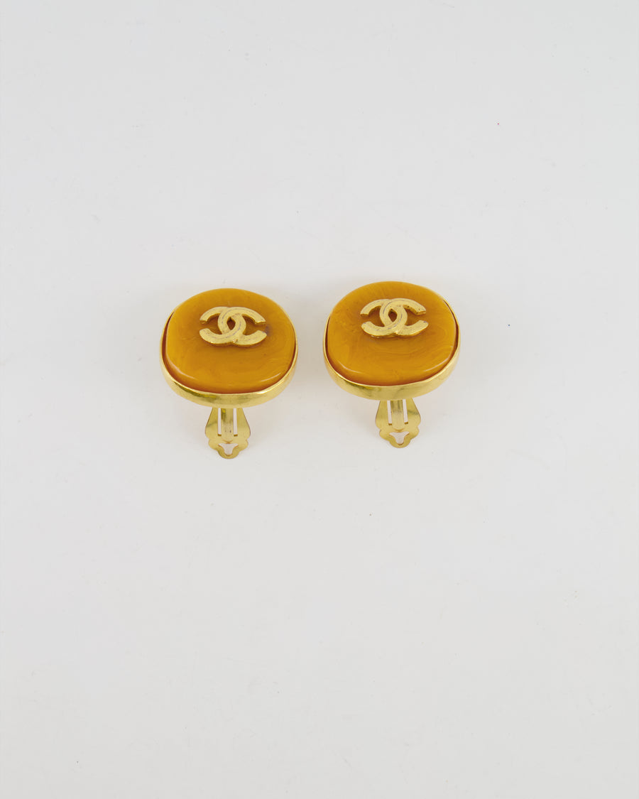 Chanel Vintage 98P Orange Rounded Clip On Earrings with Gold Rim and CC Logo Detail