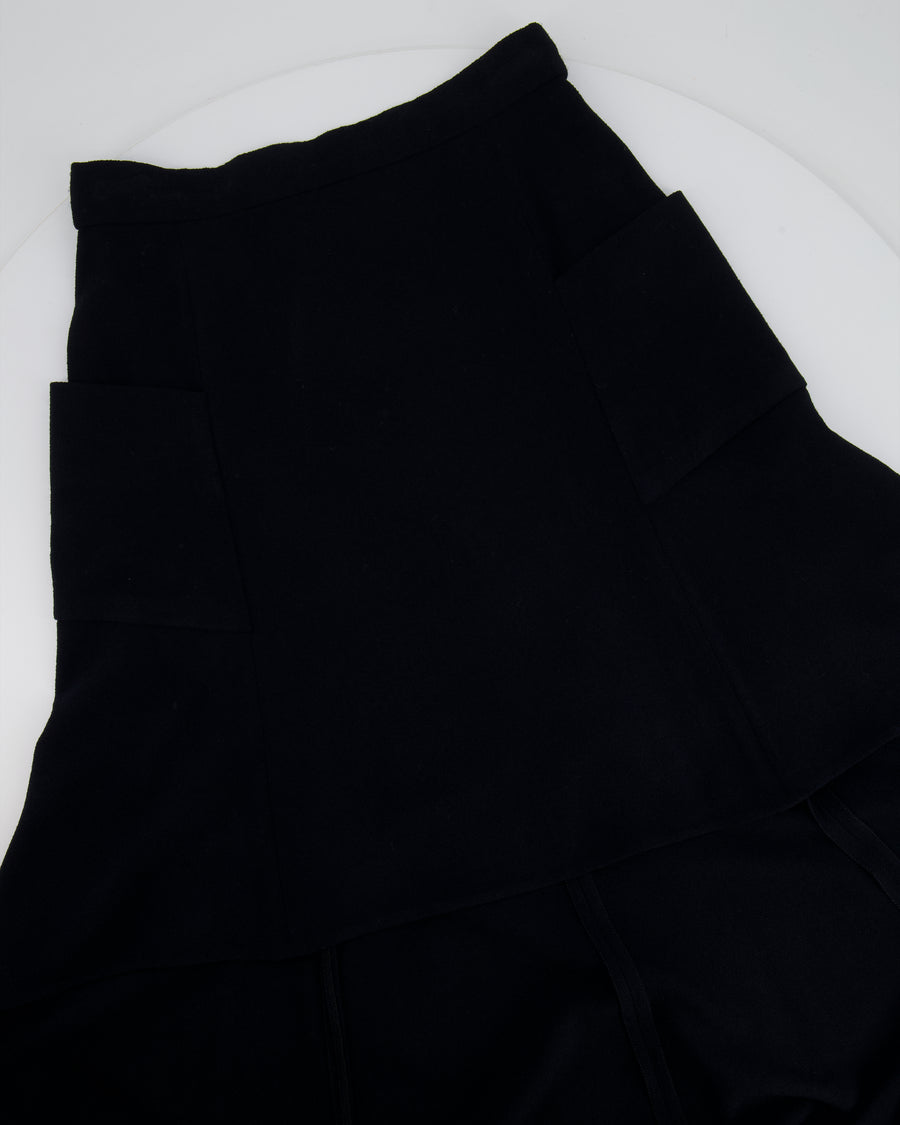 *RUNWAY* Chanel Métiers d'Art 2023 Black Front-Cropped Midi Skirt with Back Gold CC Logo Button Detail Size FR 34 (UK 6)