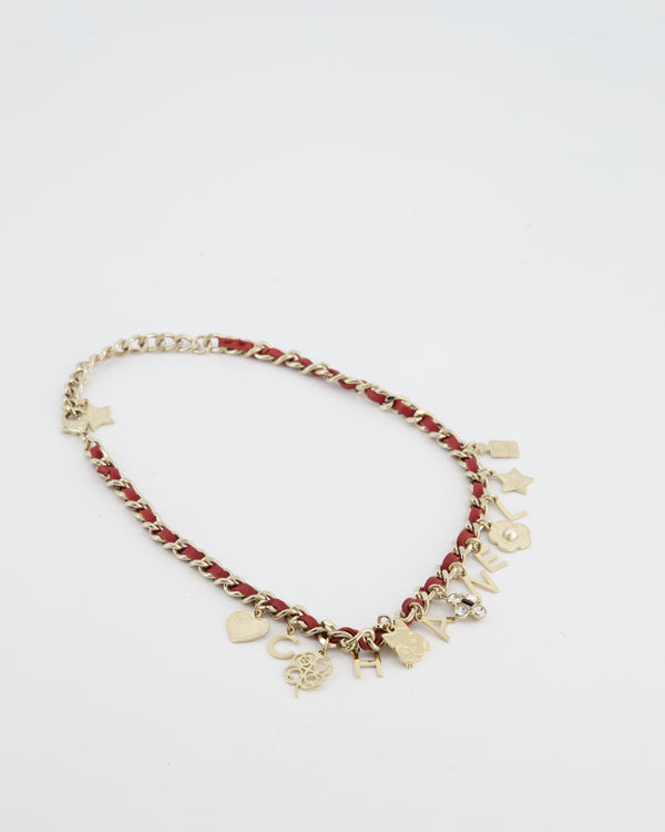 Chanel Necklace with a Red Leather-Woven Chain and Multiple Gold Charms