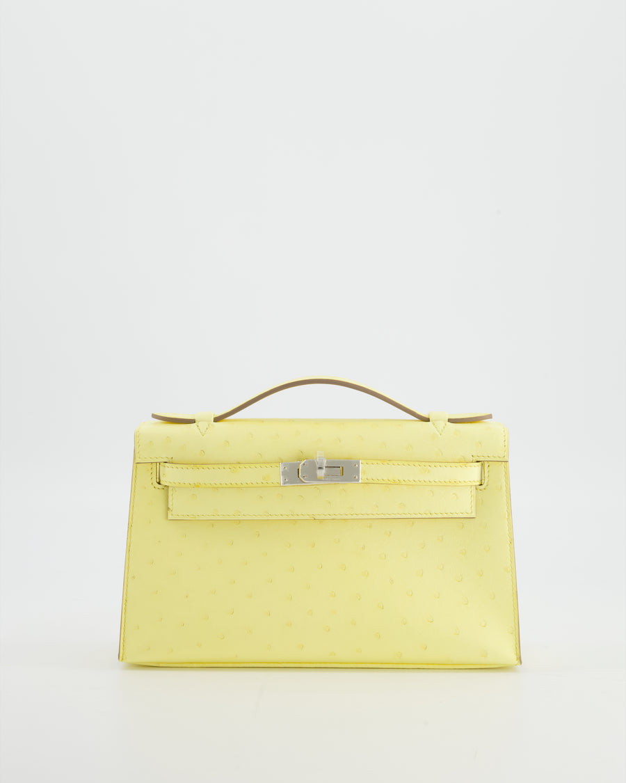 Hermès Kelly Pochette Bag in Limoncello Ostrich Leather with Palladium Hardware
