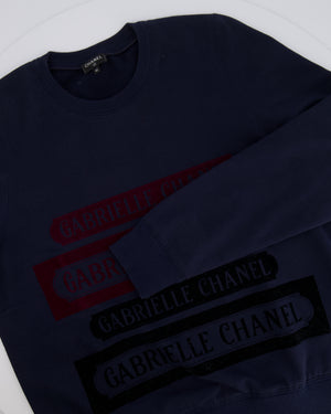 Chanel 17A Navy Crewneck Jumper with Black and Burgundy Velours Gabrielle Chanel Prints and Silver and Black CC Logo Button Detail Size FR 40 (UK 12)