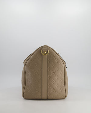 Louis Vuitton Keepall 45 Bandoulière Travel Bag in Beige Tourterelle Monogram Empreinte Giant Leather with Gold Hardware RRP £2,740
