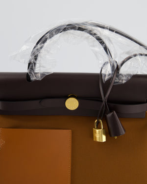 *SUPER HOT* Hermès Herbag 31 Zip Pocket Cargo Bag in Fauve Toile Militaire Canvas, Ebene Vache Hunter Leather with Gold Hardware