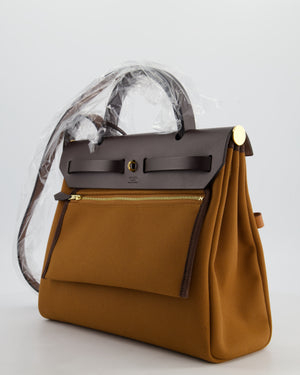 *SUPER HOT* Hermès Herbag 31 Zip Pocket Cargo Bag in Fauve Toile Militaire Canvas, Ebene Vache Hunter Leather with Gold Hardware