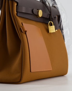 *SUPER HOT* Hermès Herbag 31 Zip Pocket Cargo Bag in Fauve Toile Militaire Canvas, Ebene Vache Hunter Leather with Gold Hardware