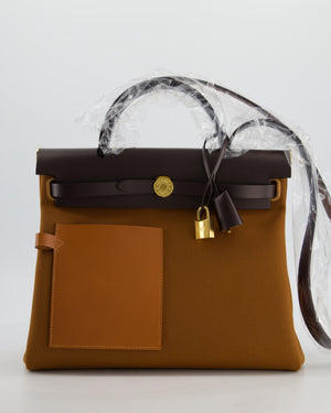 *SUPER HOT* Hermès Herbag 31 Zip Pocket Cargo Bag in Fauve Toile Militaire Canvas, Ebene Vache Hunter Leather with Gold Hardware