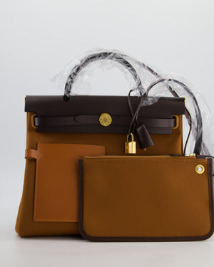 *SUPER HOT* Hermès Herbag 31 Zip Pocket Cargo Bag in Fauve Toile Militaire Canvas, Ebene Vache Hunter Leather with Gold Hardware