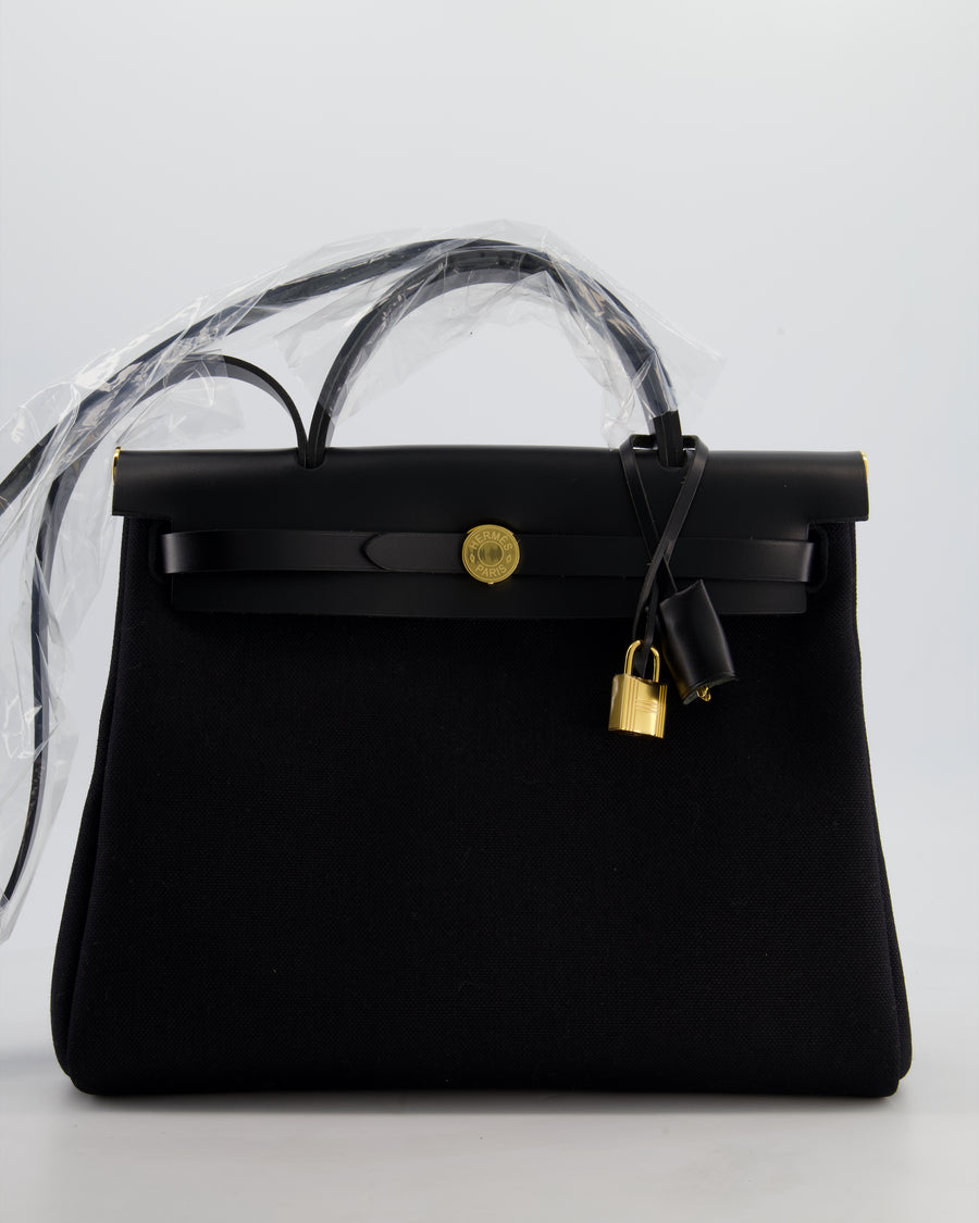Hermès Herbag 31 Zip Bag in Noir Toile Officier Canvas, Noir Vache Hunter Leather with Gold Hardware