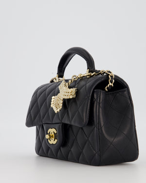 Chanel Black Mini Rectangular Top Handle Flap Bag in Lambskin Leather with Champagne Hardware and Strass Removable Bow Charm