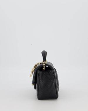 Chanel Black Mini Rectangular Top Handle Flap Bag in Lambskin Leather with Champagne Hardware and Strass Removable Bow Charm