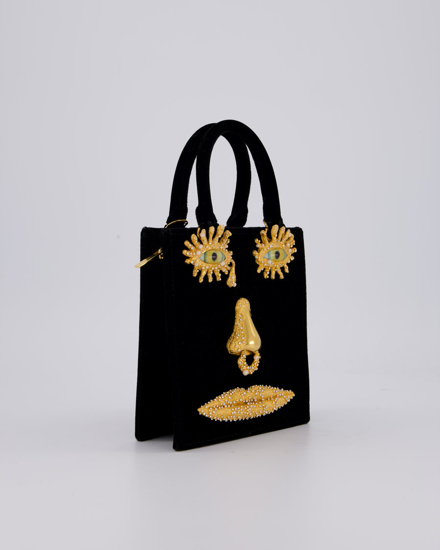 Schiaparelli Mini Face Velvet Jewellery Top Handle Bag in Black with Crystal Embellishments and Surrealist Face Details with Gold Hardware