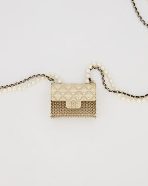 Chanel Gold Quilted Pearl Chain Necklace Featuring a Miniature Bag Pendent