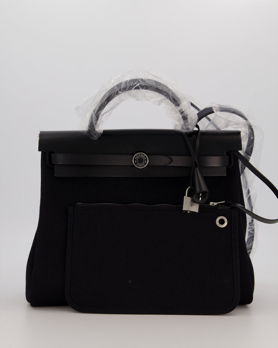 Hermès Herbag 31 Zip Bag in Noir Toile Officier Canvas, Noir Vache Hunter Leather with Palladium Hardware
