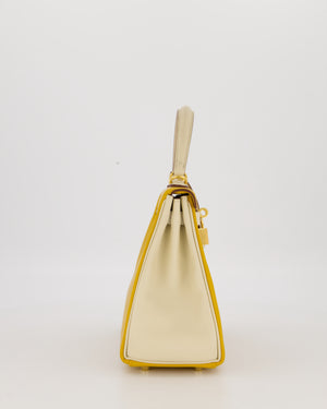 *RARE* Hermès HSS Kelly 25 Retourne Bag in Nata and Jaune Ambre Swift Leather with Gold Hardware