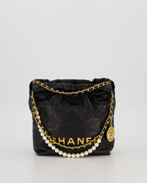 Chanel Mini 22 Bag in Black Calfskin Leather with Gold Hardware and Pearl Detail on Strap