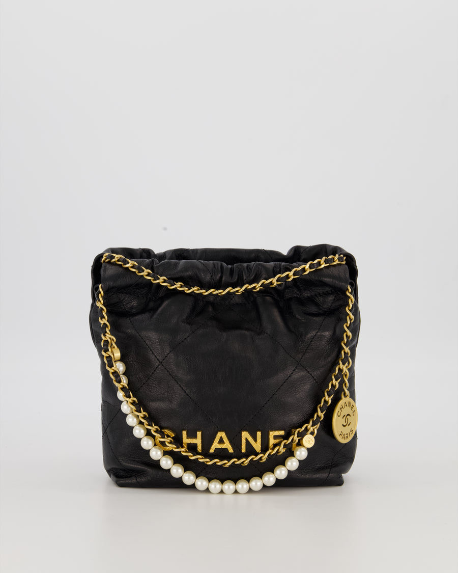 Chanel Mini 22 Bag in Black Calfskin Leather with Gold Hardware and Pearl Detail on Strap