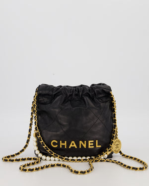 Chanel Mini 22 Bag in Black Calfskin Leather with Gold Hardware and Pearl Detail on Strap