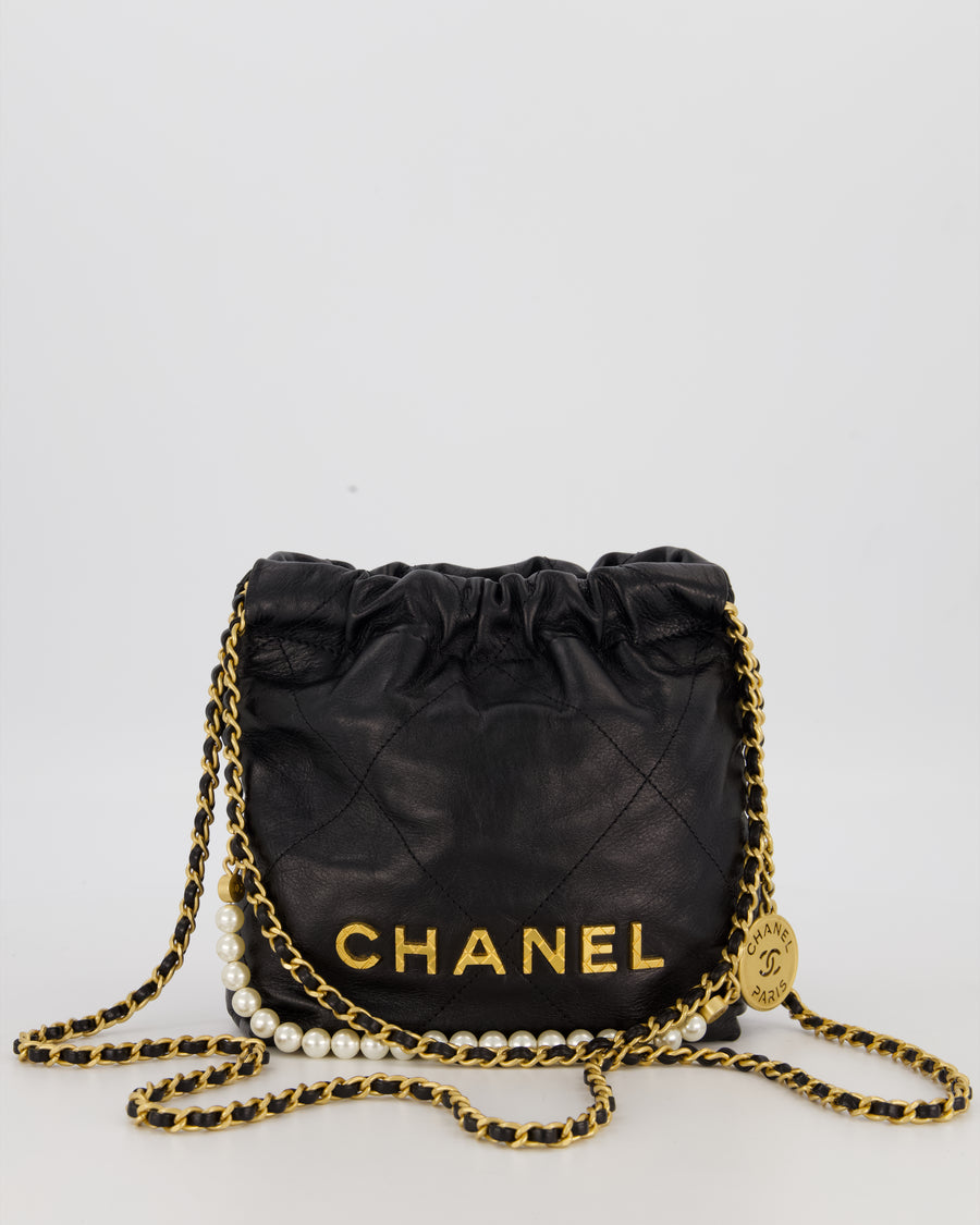 Chanel Mini 22 Bag in Black Calfskin Leather with Gold Hardware and Pearl Detail on Strap