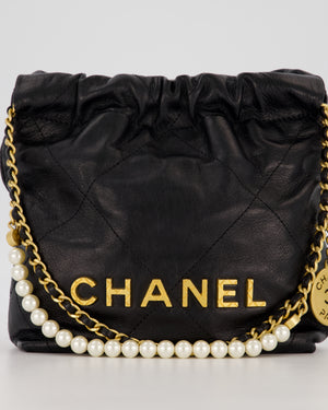 Chanel Mini 22 Bag in Black Calfskin Leather with Gold Hardware and Pearl Detail on Strap