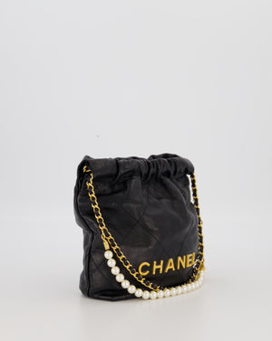 Chanel Mini 22 Bag in Black Calfskin Leather with Gold Hardware and Pearl Detail on Strap