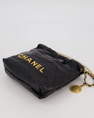 Chanel Mini 22 Bag in Black Calfskin Leather with Gold Hardware and Pearl Detail on Strap