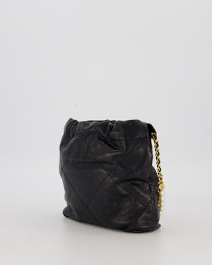 Chanel Mini 22 Bag in Black Calfskin Leather with Gold Hardware and Pearl Detail on Strap