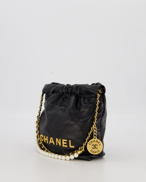 Chanel Mini 22 Bag in Black Calfskin Leather with Gold Hardware and Pearl Detail on Strap