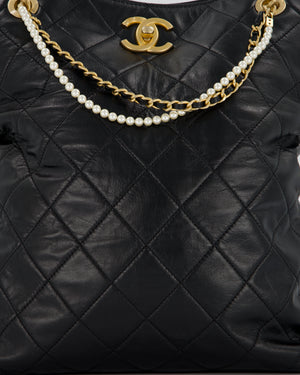 Chanel Black Quilted Fold Over Crossbody Tote Bag With Pearls Handles Details In Lambskin Leather and Gold Hardware