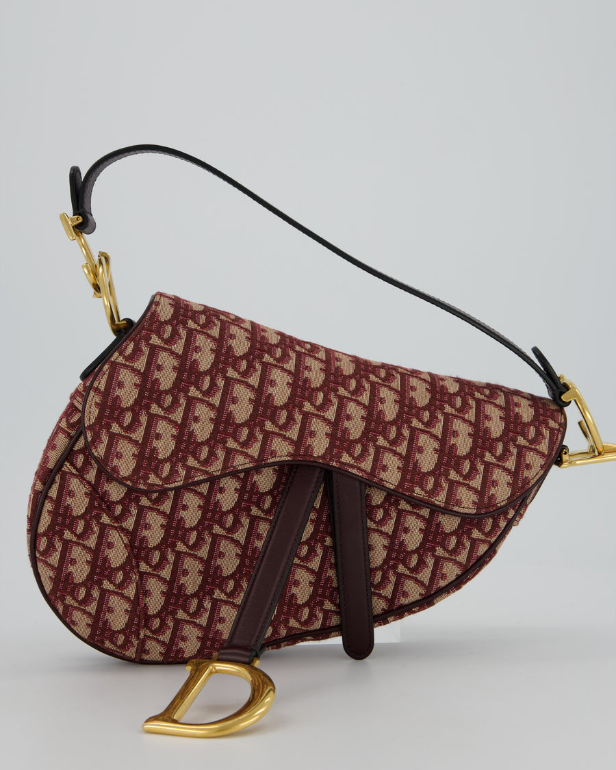 Christian Dior Medium Saddle Bag in Burgundy Oblique Canvas and Calfskin Leather with Gold Hardware and Studded Shoulder Strap