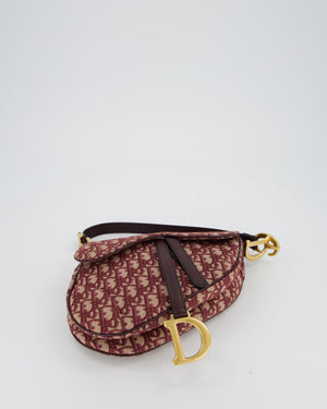 Christian Dior Medium Saddle Bag in Burgundy Oblique Canvas and Calfskin Leather with Gold Hardware and Studded Shoulder Strap