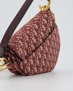 Christian Dior Medium Saddle Bag in Burgundy Oblique Canvas and Calfskin Leather with Gold Hardware and Studded Shoulder Strap