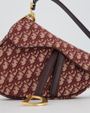 Christian Dior Medium Saddle Bag in Burgundy Oblique Canvas and Calfskin Leather with Gold Hardware and Studded Shoulder Strap