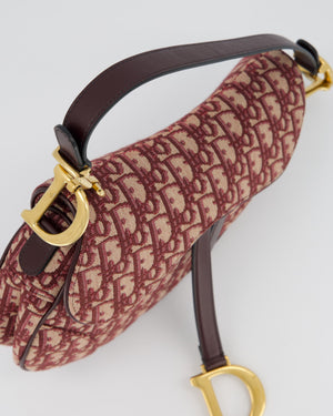 Christian Dior Medium Saddle Bag in Burgundy Oblique Canvas and Calfskin Leather with Gold Hardware and Studded Shoulder Strap