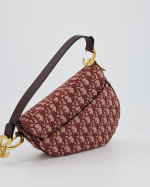 Christian Dior Medium Saddle Bag in Burgundy Oblique Canvas and Calfskin Leather with Gold Hardware and Studded Shoulder Strap