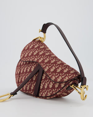 Christian Dior Medium Saddle Bag in Burgundy Oblique Canvas and Calfskin Leather with Gold Hardware and Studded Shoulder Strap