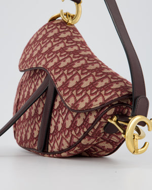 Christian Dior Medium Saddle Bag in Burgundy Oblique Canvas and Calfskin Leather with Gold Hardware and Studded Shoulder Strap
