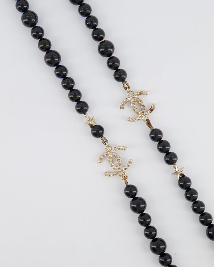 Chanel 17C Black Bead Long Necklace with Silver Stars and Studded CC Logo Details