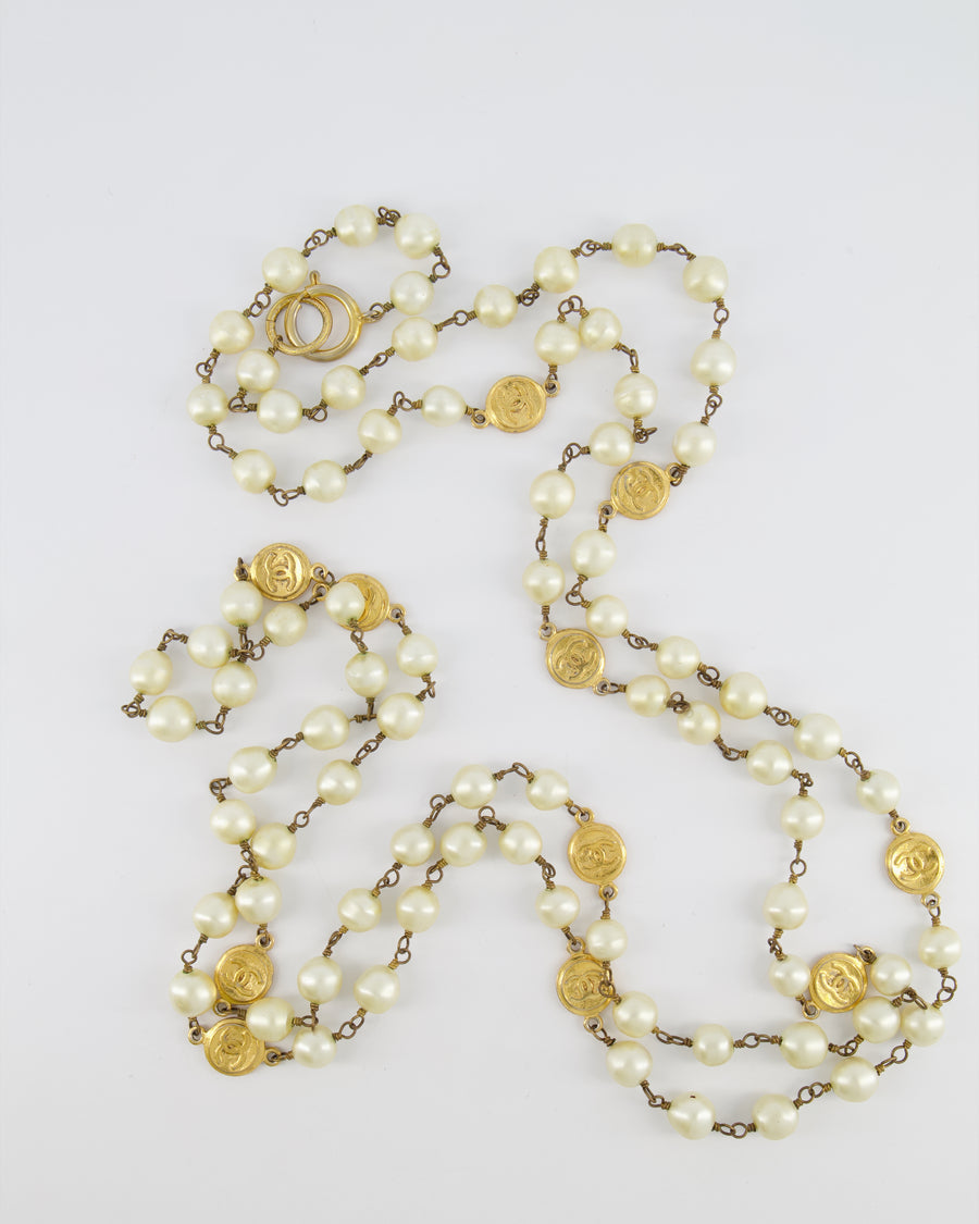 Chanel Vintage Pearl Long Necklace with Gold CC Logo Medallion Details