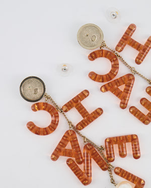 Chanel 18K Coral Pink Embellished Letter Drop Earrings with Pearl Details