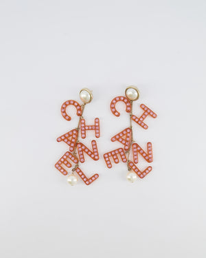 Chanel 18K Coral Pink Embellished Letter Drop Earrings with Pearl Details