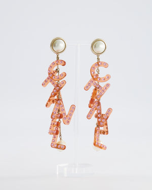 Chanel 18K Coral Pink Embellished Letter Drop Earrings with Pearl Details