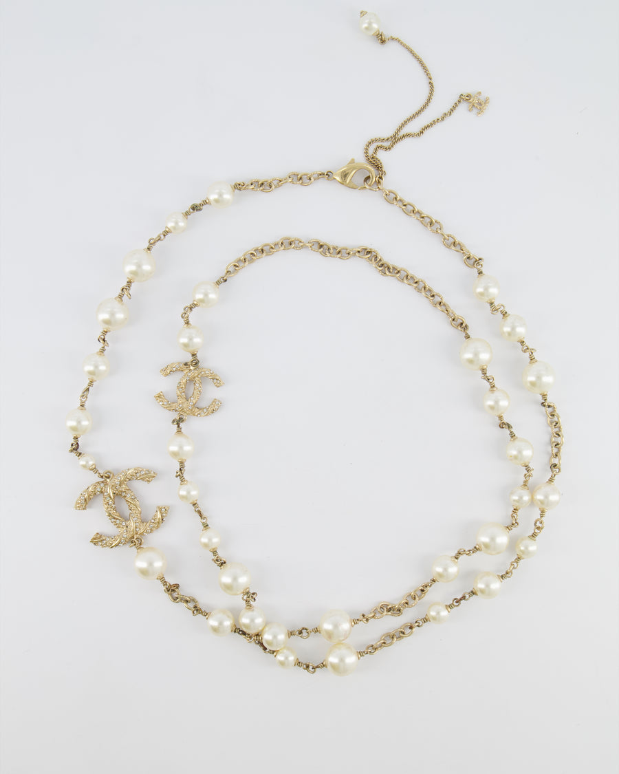 Chanel 15V Pearl Long Necklace with Gold Crystal Embellished Twisted CC Logo Detail