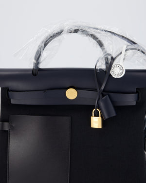 *HOT & RARE* Hermès Herbag 31 Zip Pocket Cargo Bag in Bleu Indigo Toile Militaire Canvas, Noir/Bleu Indigo Vache Hunter Leather with Gold Hardware