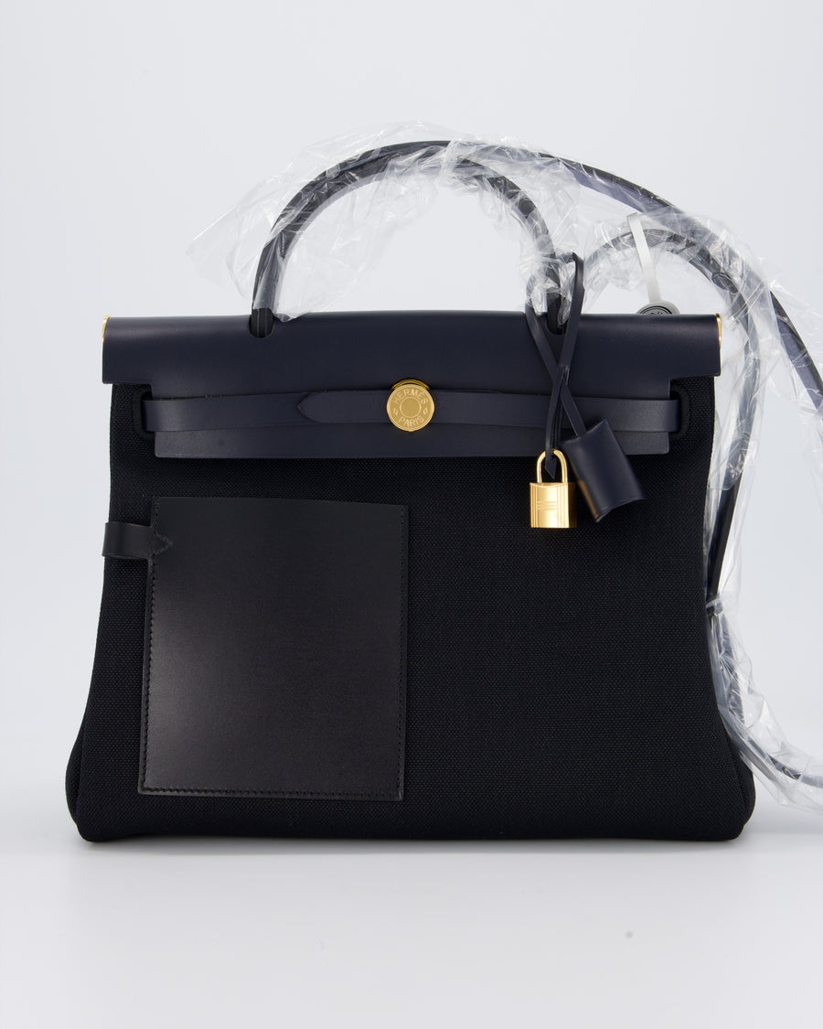 *HOT & RARE* Hermès Herbag 31 Zip Pocket Cargo Bag in Bleu Indigo Toile Militaire Canvas, Noir/Bleu Indigo Vache Hunter Leather with Gold Hardware