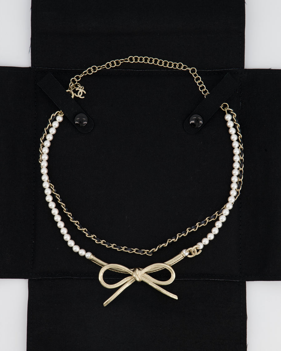 Chanel Gold Chain And Pearl Necklace With Gold Bow Details